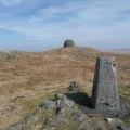 The trig point and summit cairn on Drygarn Fawr