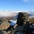 Stone built trig point at summit of Carn Geuradainn (594m)