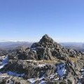 The summit cairn of Sgurr Ghiubhsachain