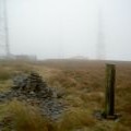 A post, cairn and radio masts