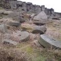 Abandoned millstones below High Neb