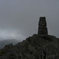 Trig point on Place Fell in cloud