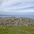 The summit cairn of Drosgl is large but not shapely